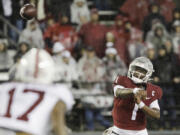 Washington State quarterback Cameron Ward (1) throws a pass during the first half of an NCAA college football game against Stanford, Saturday, Nov. 4, 2023, in Pullman, Wash.