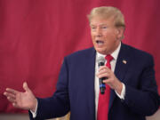 FILE - Republican presidential candidate and former President Donald Trump speaks to Texas state troopers and guardsmen at the South Texas International Airport, Sunday, Nov. 19, 2023, in Edinburg, Texas. A federal appeals court is hearing arguments Monday, Nov. 20, on whether to reinstate a gag order against Donald Trump in the federal case charging him with plotting to overturn the results of the 2020 presidential election.