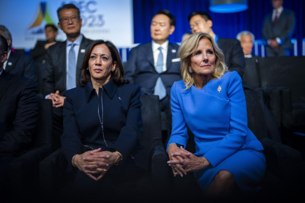 Vice President Kamala Harris and first lady Jill Biden listen as President Joe Biden speaks at welcome reception for Asia-Pacific Economic Cooperative leaders at the Exploratorium, in San Francisco, Wednesday, Nov, 15, 2023.