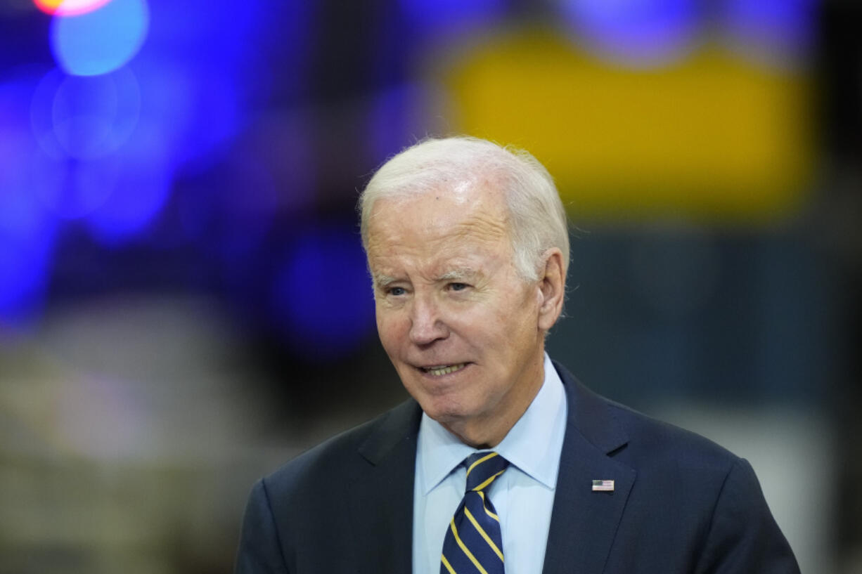 FILE - President Joe Biden speaks at the Amtrak Bear Maintenance Facility, Monday, Nov. 6, 2023, in Bear, Del. Biden on Thursday is heading to Belvidere, Ill., to celebrate an auto plant that has reopened as part of the resolution of a targeted strike by the United Auto Workers union.