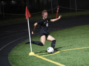 Camas junior Saige McCusker takes a corner kick during Camas' 2-0 win over Skyview in a Class 4A bi-district girls soccer playoff match at District Stadium in Battle Ground on Thursday, Nov. 2, 2023.