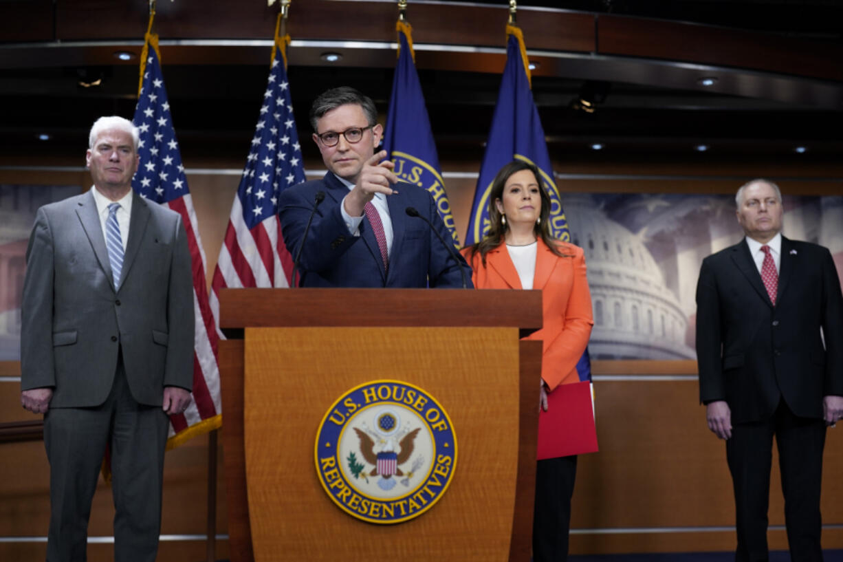 Speaker of the House Mike Johnson, R-La., center, joined by, from left, Majority Whip Tom Emmer, R-Minn., Republican Conference Chair Elise Stefanik, R-N.Y., and House Majority Leader Steve Scalise, R-La., talks with reporters ahead of the debate and vote on supplemental aid to Israel, at the Capitol in Washington, Thursday, Nov. 2, 2023. (AP Photo/J.