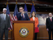 Speaker of the House Mike Johnson, R-La., center, joined by, from left, Majority Whip Tom Emmer, R-Minn., Republican Conference Chair Elise Stefanik, R-N.Y., and House Majority Leader Steve Scalise, R-La., talks with reporters ahead of the debate and vote on supplemental aid to Israel, at the Capitol in Washington, Thursday, Nov. 2, 2023. (AP Photo/J.