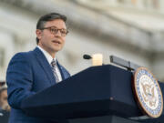 House Speaker Mike Johnson of Louisiana, speaks as members of Congress hold a candlelight vigil Tuesday for Israel on the steps of the U.S. House of Representatives.