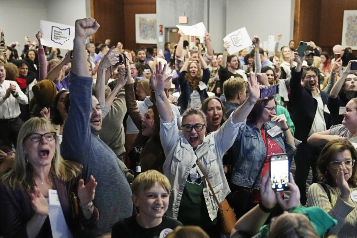 Issue 1 supporters cheer as they watch election results come in, Tuesday, Nov. 7, 2023, in Columbus Ohio. Ohio voters have approved a constitutional amendment that guarantees the right to abortion and other forms of reproductive health care. The outcome of Tuesday&rsquo;s intense, off-year election was the latest blow for abortion opponents.