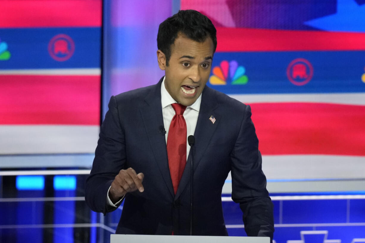 FILE - Republican presidential candidate businessman Vivek Ramaswamy speaks during a Republican presidential primary debate hosted by NBC News, Nov. 8, 2023, at the Adrienne Arsht Center for the Performing Arts of Miami-Dade County in Miami. Ramaswamy is risking becoming an afterthought in the 2024 Republican presidential race as persistent questions confront him about his age, faith, positions on Israel and his very purpose being in the fray when the man he so admires, Donald Trump, is dominating the field.