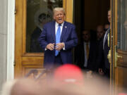 Republican presidential candidate former President Donald Trump departs after signing papers to be on the 2024 Republican presidential primary ballot at the New Hampshire Statehouse on Oct. 23 in Concord, N.H.