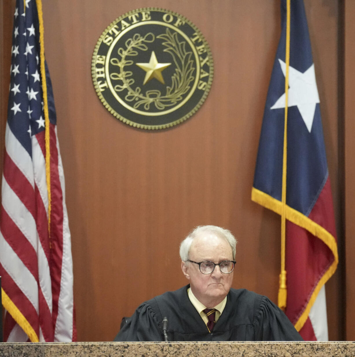 FILE - Judge David Peeples prepares to listen to arguments in a hearing about the November Harris County elections at Harris County Civil Courthouse on Aug. 1, 2023, in Houston. A Texas judge has denied a Republican effort to overturn election results in the nation&rsquo;s third-most populous county, a Democratic stronghold that&rsquo;s been beset by GOP efforts to dictate how ballots are cast.