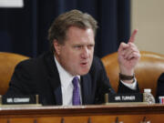 FILE - Rep. Mike Turner, R-Ohio, speaks during a House Intelligence Committee hearing on Capitol Hill in Washington, Nov. 20, 2019. Turner, the Republican chairman of the House Intelligence Committee, is calling for the renewal of a key U.S. government surveillance tool while also proposing a series of changes aimed at safeguarding privacy. The proposals announced Thursday are part of a late scramble inside Congress and the White House to guarantee the reauthorization of Section 702 of the Foreign Intelligence Surveillance Act., which allows spy agencies to collect emails and other communications.