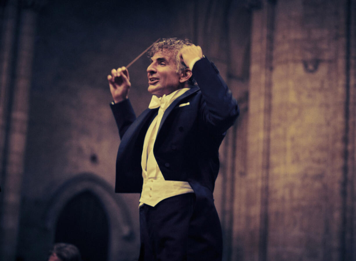 This image released by Netflix shows Bradley Cooper as Leonard Bernstein in a scene from &ldquo;Maestro.&rdquo; (Jason McDonald/Netflix via AP)