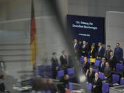 German Chancellor Olaf Scholz, bottom right, arrives for a debate at the parliament Bundestag about antisemitism and the protection of Jewish life in Germany, on the 85th anniversary of the November 1938 progroms in Germany and Austria, in central Berlin, Germany, Thursday, Nov. 9, 2023. According to Israel&rsquo;s Yad Vashem Holocaust memorial, the Nazis killed at least 91 people, vandalized 7,500 Jewish businesses and burned more than 1,400 synagogues during Nov. 9, 1938 pogroms known as Kristallnacht or &lsquo;Night of broken Glass&rsquo;.