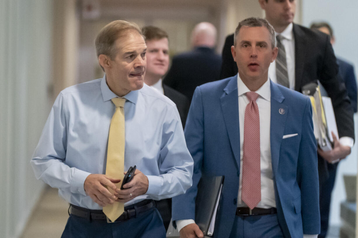 Rep. Jim Jordan, R-Ohio, left, arrives to hear from U.S. Attorney David Weiss in an interview before members of the House Judiciary Committee, Tuesday, Nov. 7, 2023, in Washington. The special counsel overseeing the Hunter Biden investigation is testifying behind closed doors as a GOP probe into the Justice Department&rsquo;s handling of the case continues to unfold.