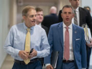 Rep. Jim Jordan, R-Ohio, left, arrives to hear from U.S. Attorney David Weiss in an interview before members of the House Judiciary Committee, Tuesday, Nov. 7, 2023, in Washington. The special counsel overseeing the Hunter Biden investigation is testifying behind closed doors as a GOP probe into the Justice Department&rsquo;s handling of the case continues to unfold.