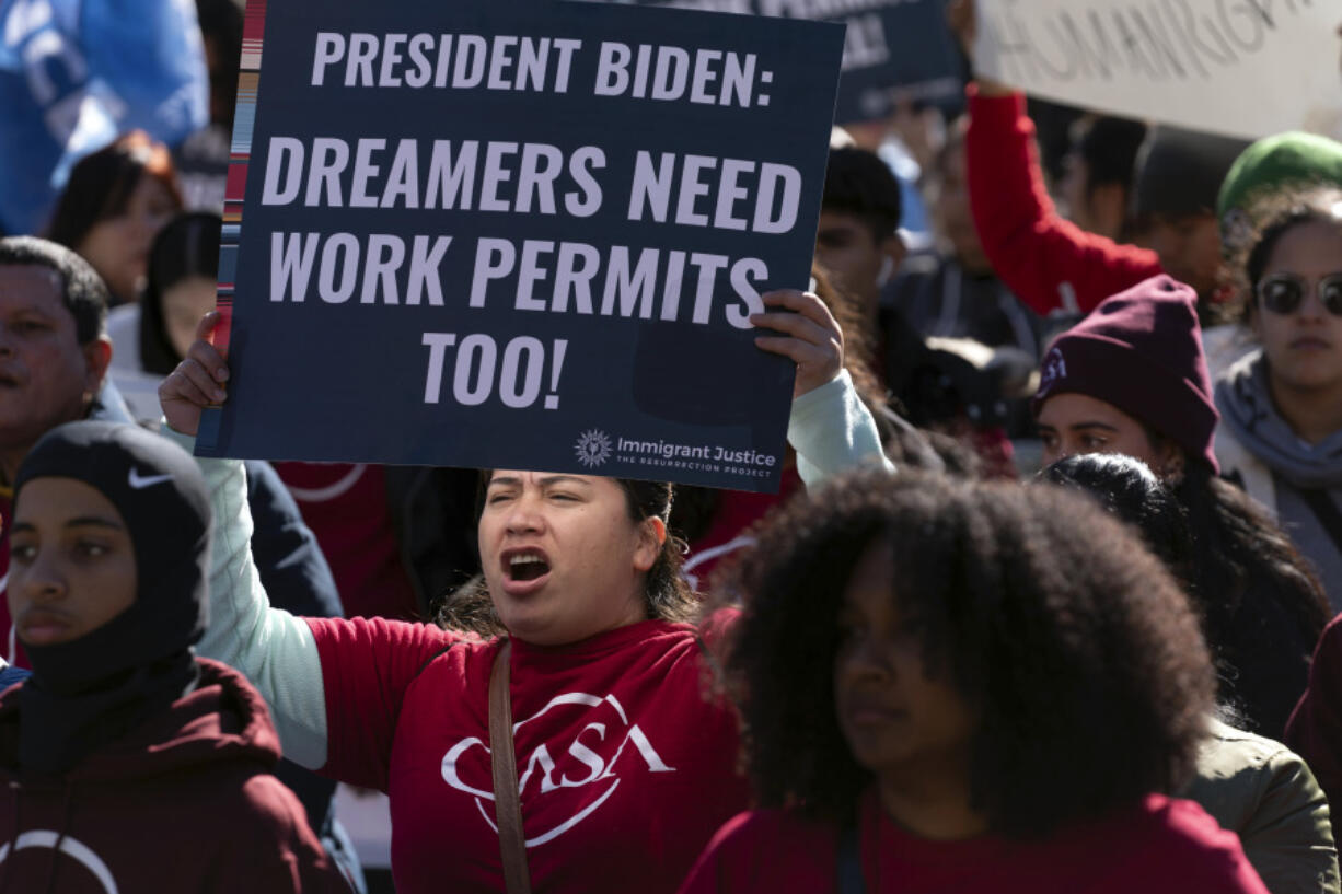 Immigrants who have been in the U.S. for years, rally asking for work permits for Deferred Action for Childhood Arrivals (DACA), and Temporary Protected Status (TPS), programs at Franklin Park in Washington, Tuesday, Nov. 14, 2023.