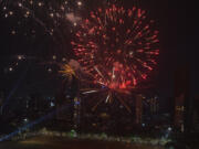 Firecrackers light up the city skyline during Diwali, the Hindu festival of lights, in Mumbai, India, Sunday, Nov. 12, 2023.