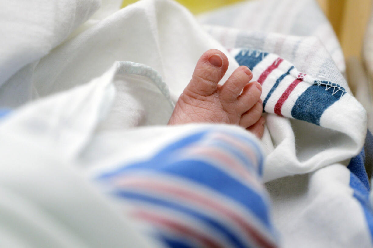 FILE - The toes of a baby peek out of a blanket at a hospital in McAllen, Texas. On Wednesday, Nov. 1, 2023, the Centers for Disease Control and Prevention reported the increase of U.S. infant mortality rate to 3% in 2022 -- a rare increase in a death statistic that has been generally been falling for decades.