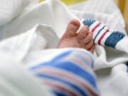 FILE - The toes of a baby peek out of a blanket at a hospital in McAllen, Texas. On Wednesday, Nov. 1, 2023, the Centers for Disease Control and Prevention reported the increase of U.S. infant mortality rate to 3% in 2022 -- a rare increase in a death statistic that has been generally been falling for decades.