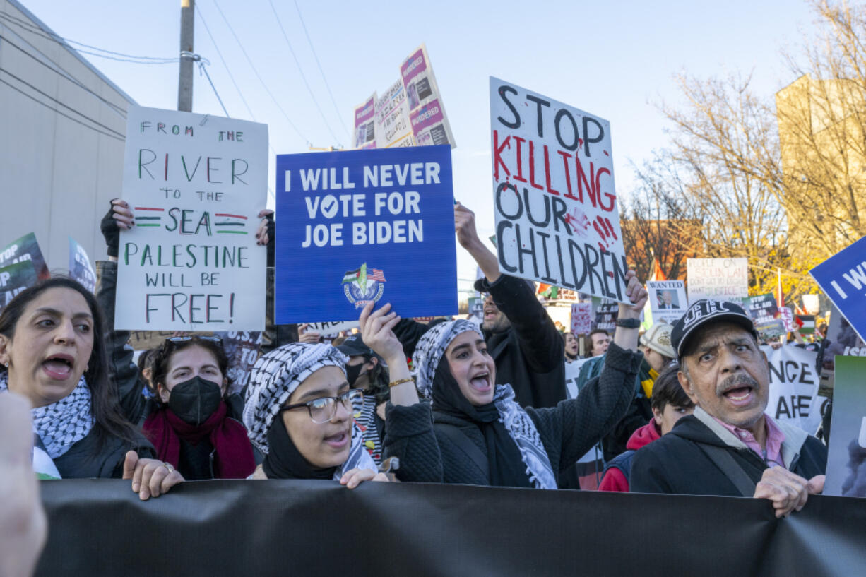 Around a thousand Palestinian and pro-Palestinian demonstrators rally at the corner of W. Hubbard St. and N. Armour St. near where President Joe Biden was attending a fundraising event in the West Town neighborhood of Chicago, Thursday, Nov. 9, 2023. Demonstrators were demanding that the President as well as national Democrats use their power to broker a ceasefire between Israel and Hamas whose conflict has killed thousands of civilians most of whom are Palestinian.