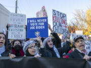 Around a thousand Palestinian and pro-Palestinian demonstrators rally at the corner of W. Hubbard St. and N. Armour St. near where President Joe Biden was attending a fundraising event in the West Town neighborhood of Chicago, Thursday, Nov. 9, 2023. Demonstrators were demanding that the President as well as national Democrats use their power to broker a ceasefire between Israel and Hamas whose conflict has killed thousands of civilians most of whom are Palestinian.