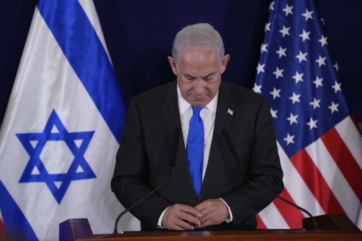 FILE - Israel's Prime Minister Benjamin Netanyahu make statements with the U.S. Secretary of State Antony Blinken to the media, inside The Kirya, which houses the Israeli Ministry of Defense, after their meeting in Tel Aviv, Thursday Oct. 12, 2023. A growing list of Israeli officials have accepted responsibility for failing to prevent Hamas' brutal attack on Israeli communities during the Oct. 7 incursion that triggered the current Israel-Hamas war. Conspicuously absent from that roll call is Prime Minister Benjamin Netanyahu.