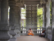 Sannyasin Siddhanathaswami sits in the Iraivan Temple at the Kauai Hindu Monastery on July 9 in Kapaa, Hawaii.