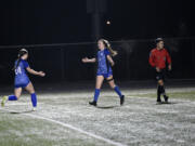 Shaela Bradley of La Center (right) celebrates her second goal of the match with Briley Vanderhoef (24) during the Wildcats’ 3-2 win over Meridian of Bellingham in a Class 1A girls soccer state tournament first-round match at Woodland High School on Wednesday, Nov. 8, 2023.