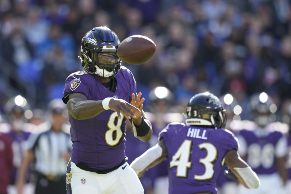 Baltimore Ravens quarterback Lamar Jackson throws during the second half of an NFL football game against the Detroit Lions, Sunday, Oct. 22, 2023, in Baltimore.