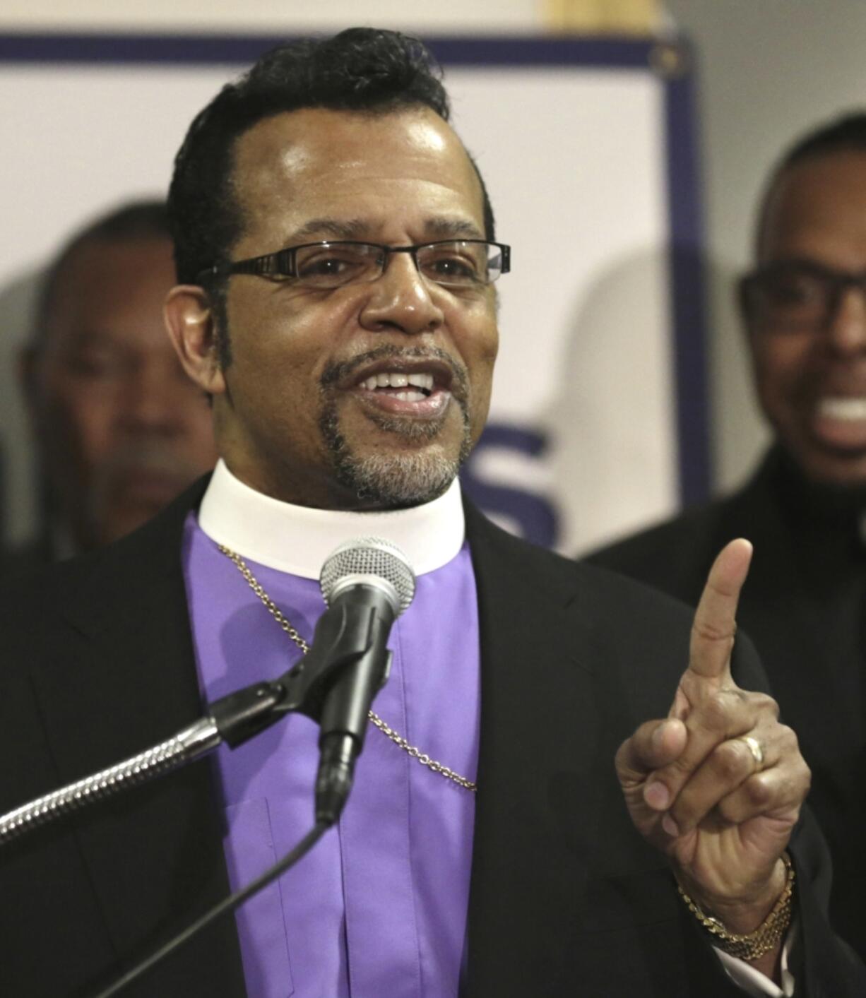 FILE - Bishop Carlton Pearson speaks at a news conference accompanied by several other clergy members, April 4, 2013, in Chicago. Bishop Carlton Pearson died Sunday, Nov. 19, 2023 in hospice care in Tulsa due to cancer according to his agent. He was 70. (AP Photo/M.