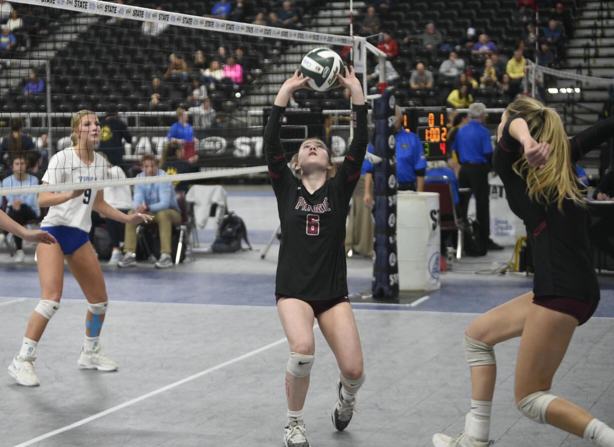 Prairie's Marissa Raley sets the ball for a kill attempt by Ali Milspaugh, right, during a round of 16 match against Gig Harbor at the Class 3A state volleyball tournament on Friday, Nov. 17, 2023 in Yakima.