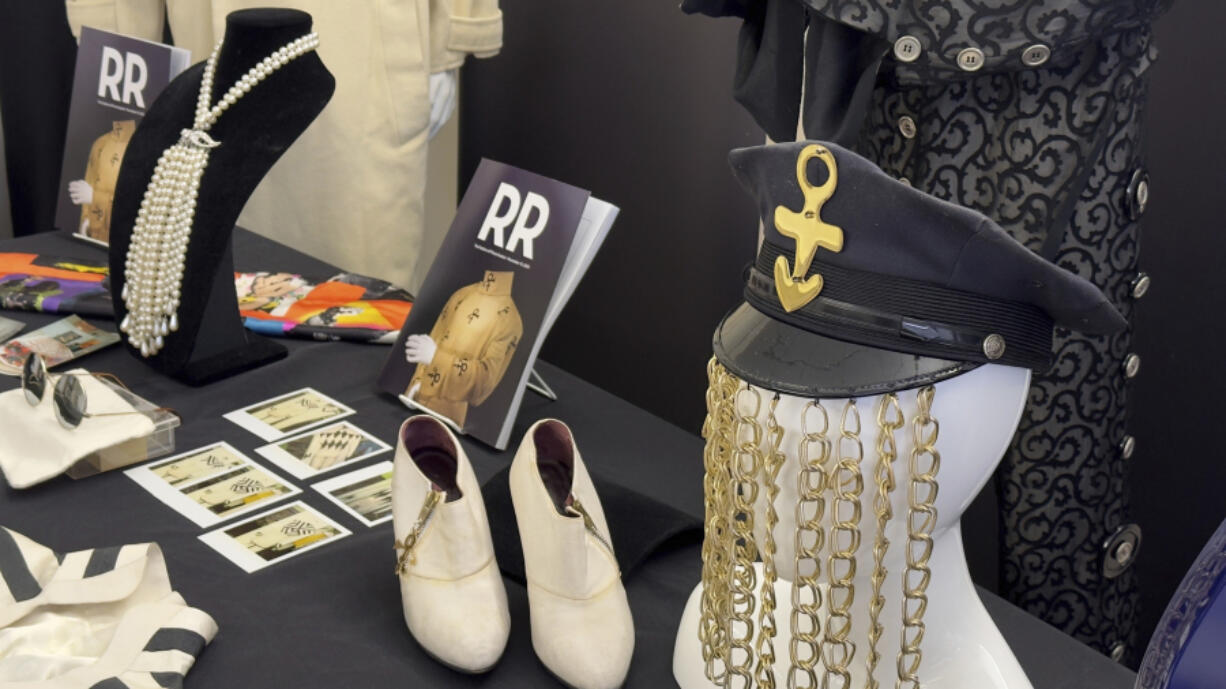 Some of the distinctive fashion pieces worn by the late pop superstar Prince appear on display at an auction house in Amherst, N.H., Monday, Nov. 13, 2023, as fans prepare to celebrate the 40th anniversary of &ldquo;Purple Rain.&rdquo; RR Auction of Boston says the collection was assembled by a French collector based in Paris who had originally hoped to open a museum celebrating one of the most inventive and influential musicians of modern times until Paisley Park opened, prompting him to put his pieces up for auction.