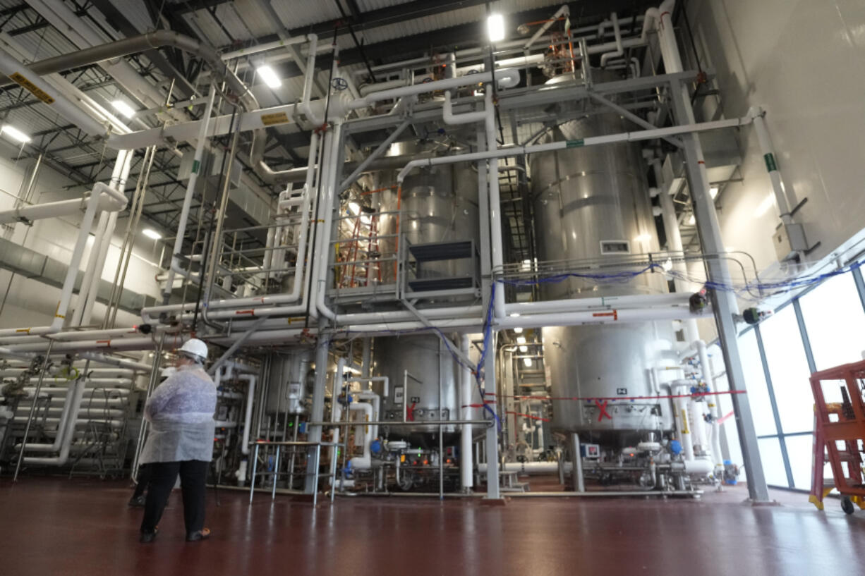 Fermentation tanks containing mushroom roots stand in the production facility of Meati Wednesday, July 26, 2023, in Thornton, Colo. In four days, a single microscopic spore can produce the equivalent of a whole cow&rsquo;s worth of meat.