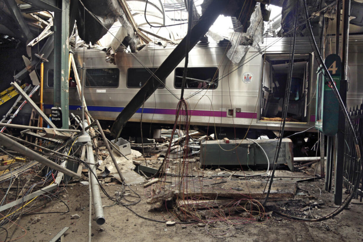 Damage from a commuter train crash that killed a woman and injured more than 100 people is seen on Sept. 29, 2016, at the Hoboken Terminal in Hoboken, N.J.