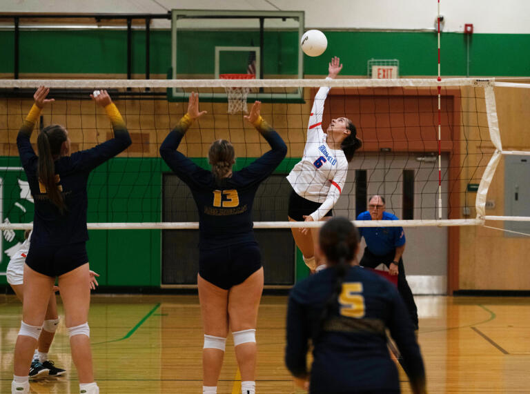 Maddy Conklin (6) swings for a spike during Ridgefield's match against Aberdeen in the first round of the 2A District 4 tournament, on Thursday, Nov. 2, 2023, at Tumwater. Ridgefield won 3-0.