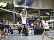 Columbia River senior Macey McCoy sets the ball during a Class 2A state quarterfinal volleyball match against Pullman on Friday, Nov, 10, 2023 in Yakima.