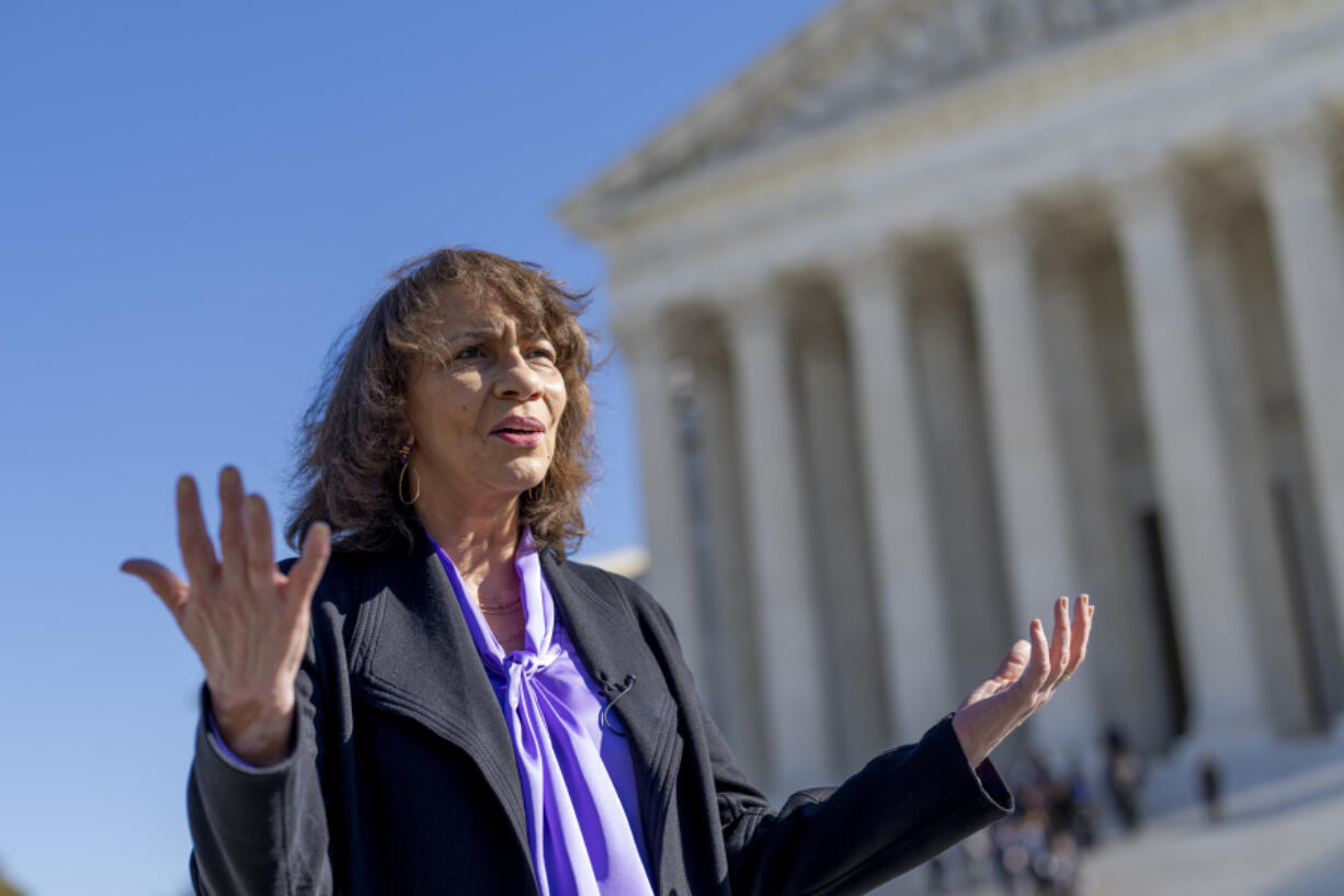 Ruth Glenn, a domestic violence survivor, speaks with The Associated Press as she discusses a case before the Supreme Court that is focused on a law aiming to keep guns out of the hands of abusers, in Washington, Monday, Oct. 23, 2023. Glenn is the president of the National Coalition Against Domestic Violence. (AP Photo/J.