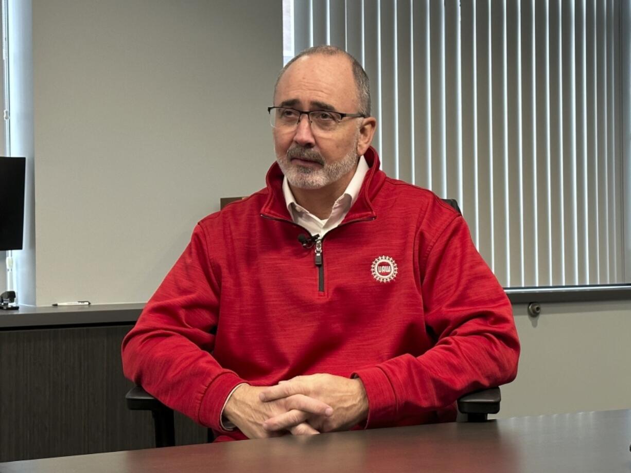 United Auto Workers President Shawn Fain speaks to a reporter from The Associated Press during an interview at the union&rsquo;s headquarters Monday, Nov. 20, 2023, in Detroit.