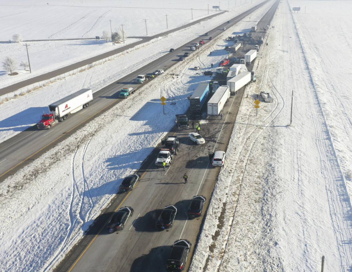 This photo provided by Idaho State Police shows a collision scene in Pocatello, Idaho, Monday Nov. 27, 2023. A thick layer of fog may have caused a 30 vehicle collision early Monday on an Idaho interstate, state police said.