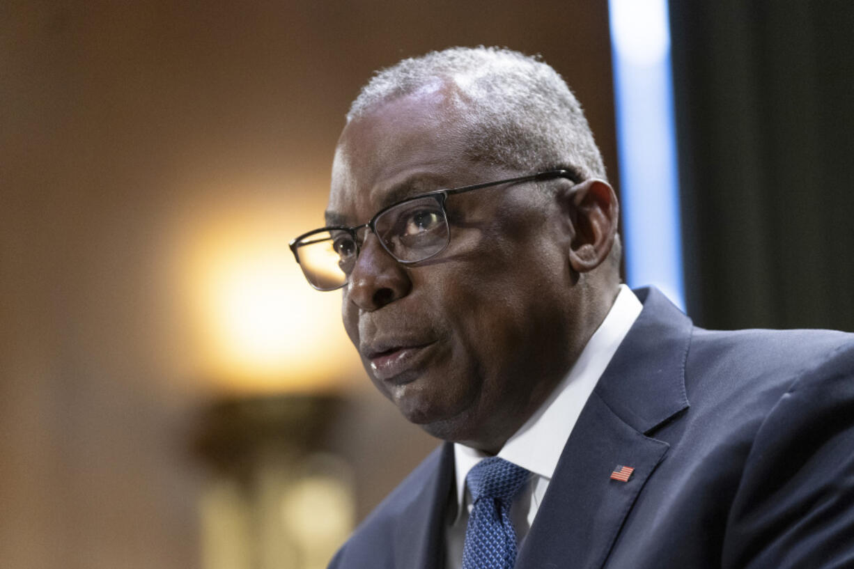 FILE - Defense Secretary Lloyd Austin testifies before a Senate Appropriations Committee on Capitol Hill in Washington, Oct. 31, 2023. The U.S. launched an airstrike on a facility in eastern Syria linked to Iranian-backed militias, in retaliation for what has been a growing number of attacks on bases housing U.S.