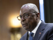 FILE - Defense Secretary Lloyd Austin testifies before a Senate Appropriations Committee on Capitol Hill in Washington, Oct. 31, 2023. The U.S. launched an airstrike on a facility in eastern Syria linked to Iranian-backed militias, in retaliation for what has been a growing number of attacks on bases housing U.S.