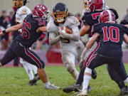 Aqeel Bauman of Hudson's Bay runs the ball in Bay's 35-14 loss to W.F. West on Saturday, Nov.