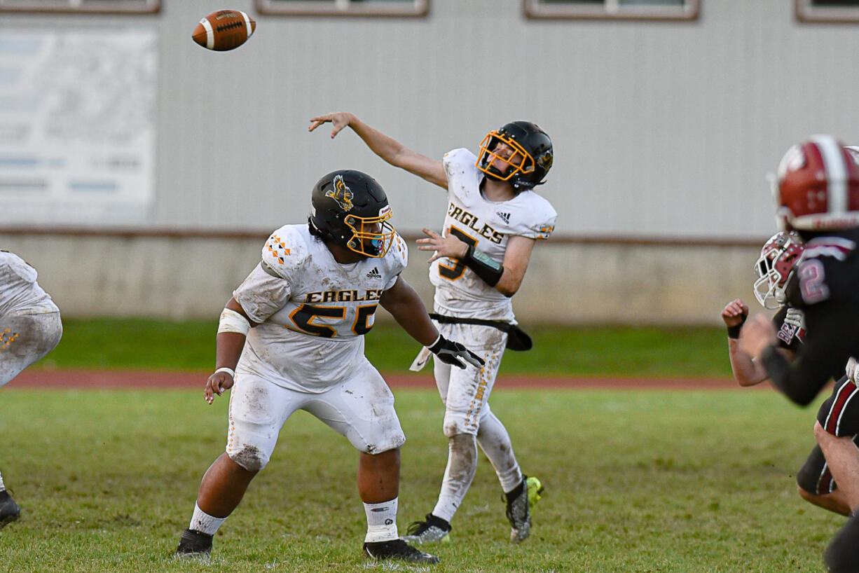 Michael Miller of Hudson's Bay attempts a pass in Bay's 35-14 loss to W.F. West on Saturday, Nov.