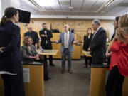 Clark County District Court administrator Bryan Farrell, center in gray, talks with law officials from the country of Georgia at the Clark County Courthouse on Tuesday morning.