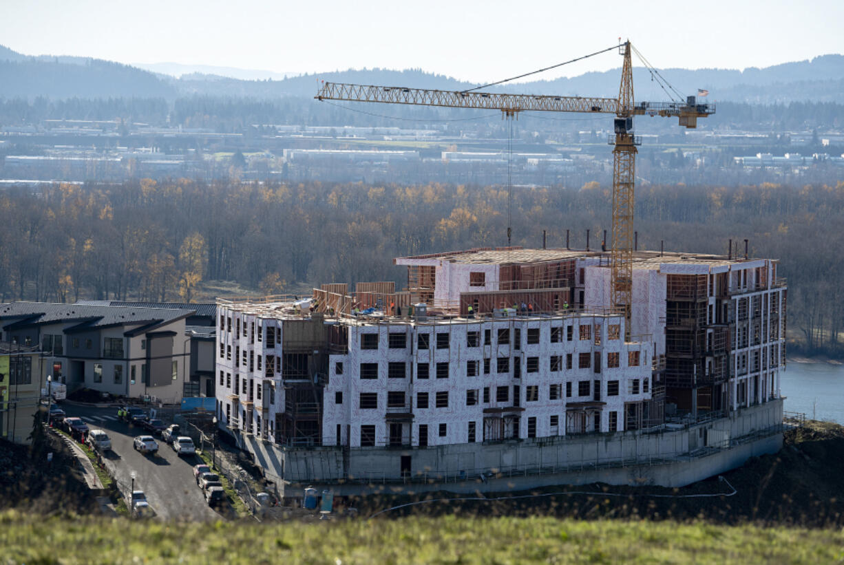 Construction continues at The Ledges at Palisades in Camas on Tuesday morning. The multifamily development is one of several around the county slated to come online in the coming years.