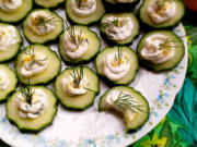 2024 is predicted to be the Year of the Snack. Make yourself a fancy snack with herbed cream cheese and cool cucumber slices.