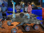 Visitors look at a replica of NASA&rsquo;s Mars Rover Opportunity during its unveiling ceremony at the Visvesvaraya Industrial and Technological Museum in Bengaluru on June 1, 2023.