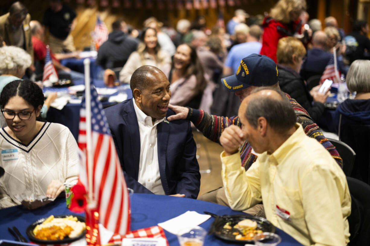 Semi Bird, center, talks to constituents at a fundraising event at The Lodge at Frontier Park in Graham, Washington, on Friday, Nov. 10, 2023.