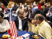 Semi Bird, center, talks to constituents at a fundraising event at The Lodge at Frontier Park in Graham, Washington, on Friday, Nov. 10, 2023.