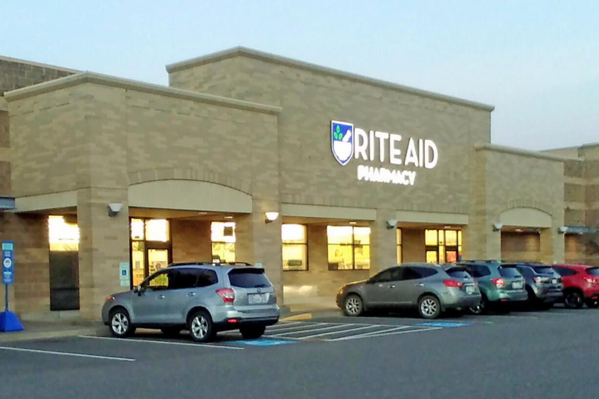 Cars line a parking lot in front of the Washougal Rite Aid store and pharmacy in November 2023.