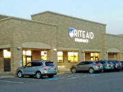 Cars line a parking lot in front of the Washougal Rite Aid store and pharmacy in November 2023.