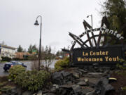 A sign welcomes visitors and residents to La Center.